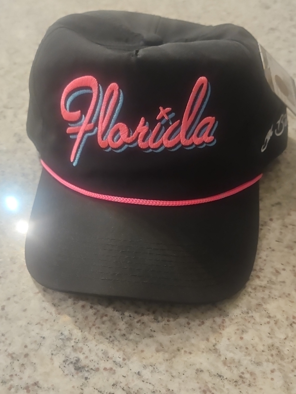 Bad Birdie Black Cap with White Script and Pink Accent